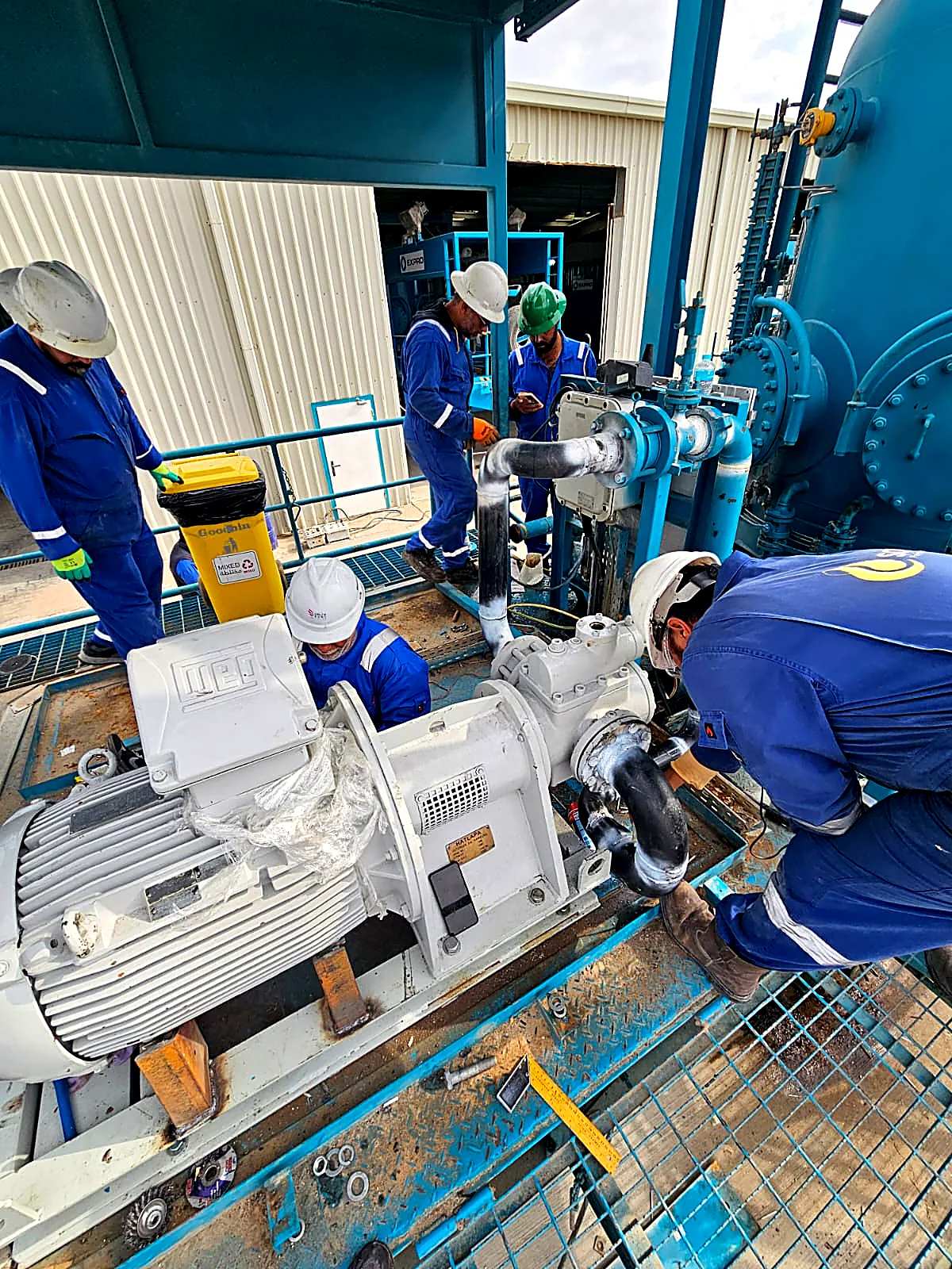 AlTawajuh technical team working safely at an industrial site